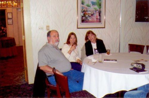 A group of people sitting at a table.