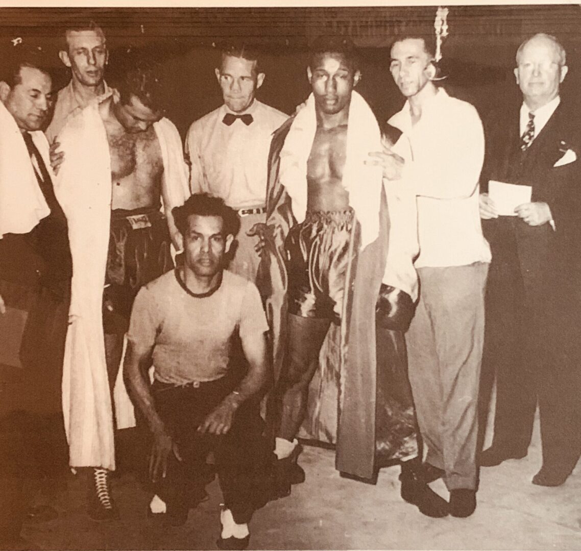 A group of men standing next to each other.