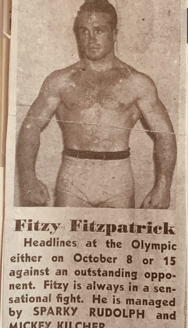 A newspaper clipping of a man in a boxing outfit.